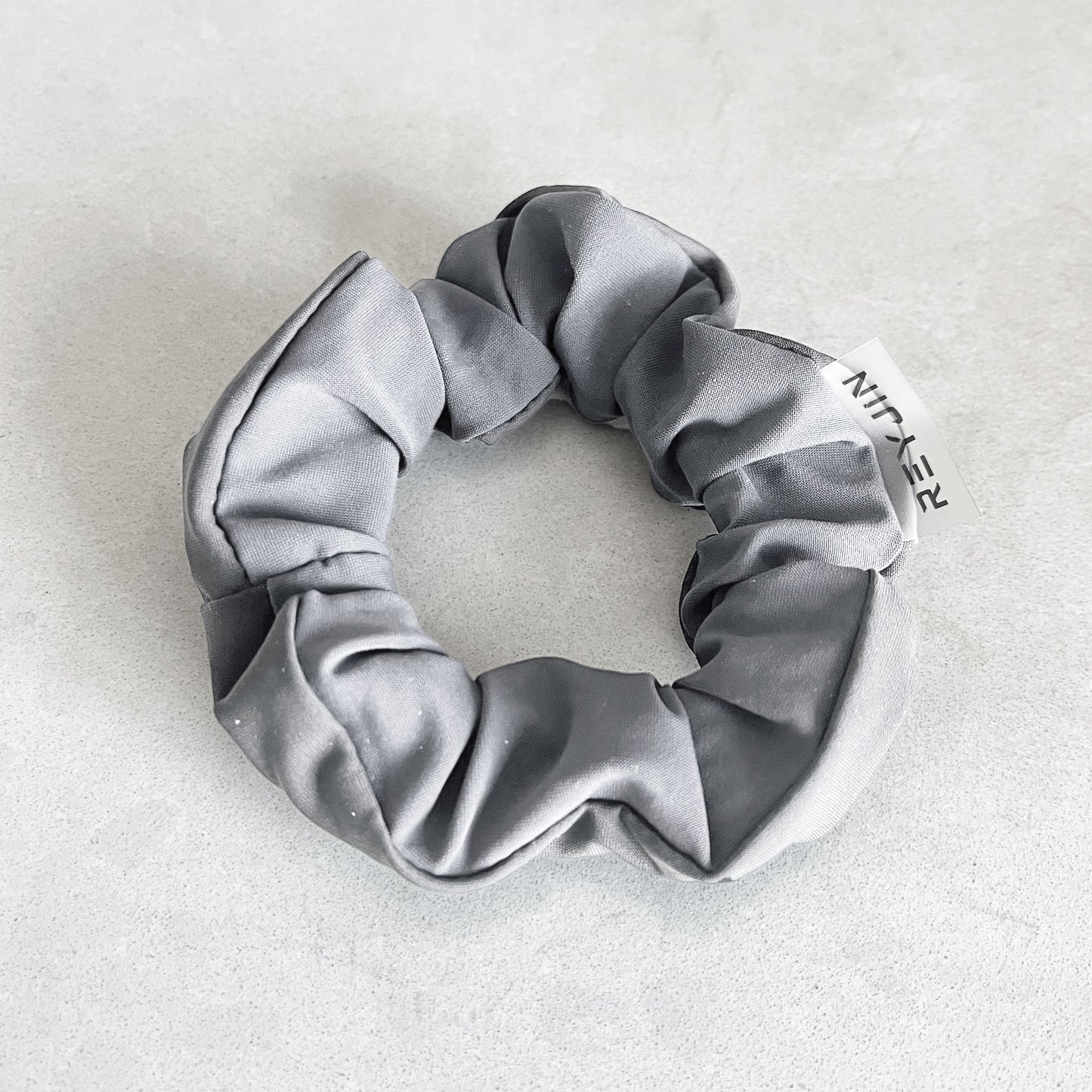 Light gray scrunchie
